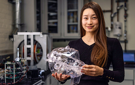 Renee Zhao holding a scientific tool