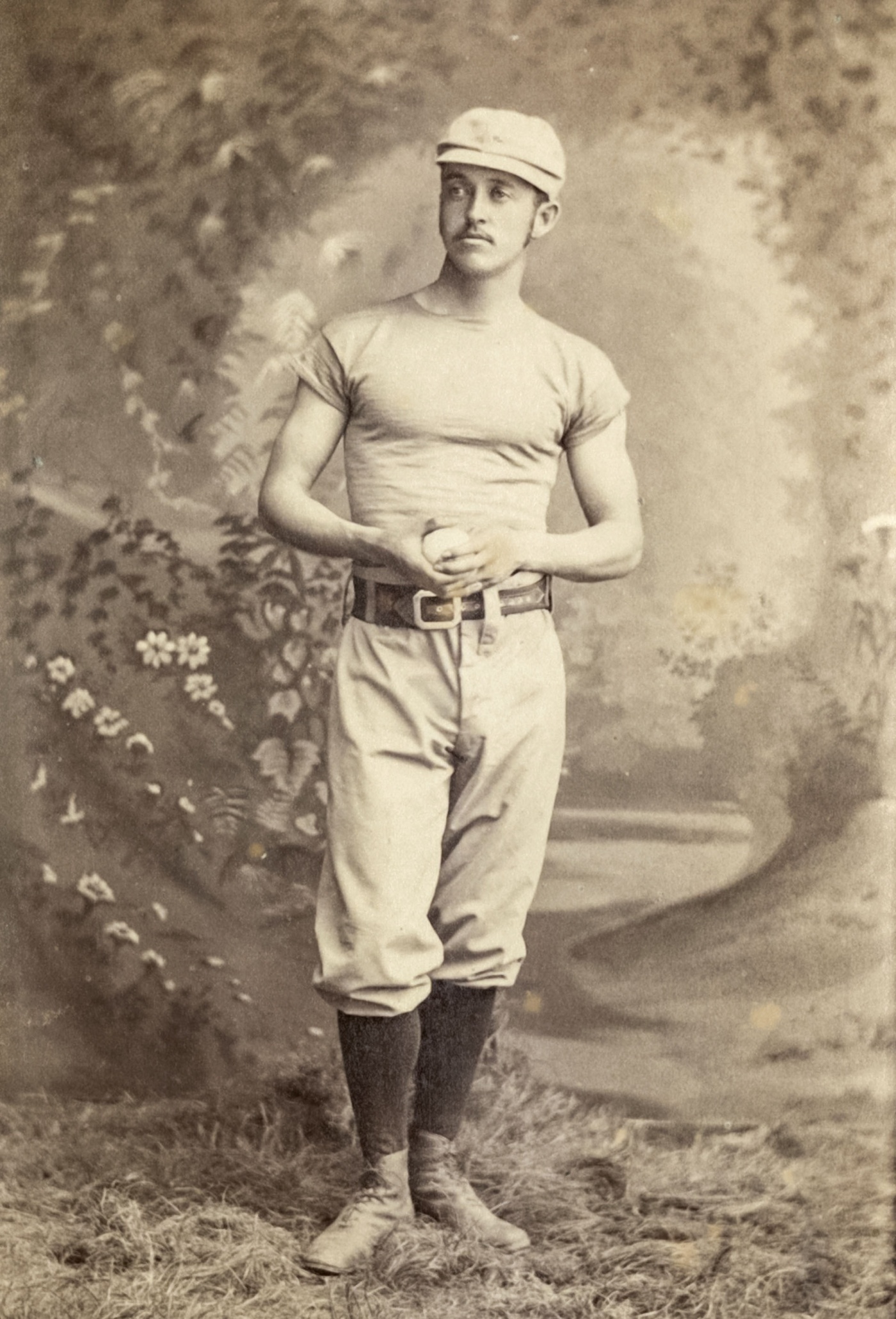 Archival image of J. Lee Richmond with a baseball