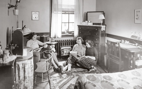 Archival image of women in a dorm room in Pembroke 