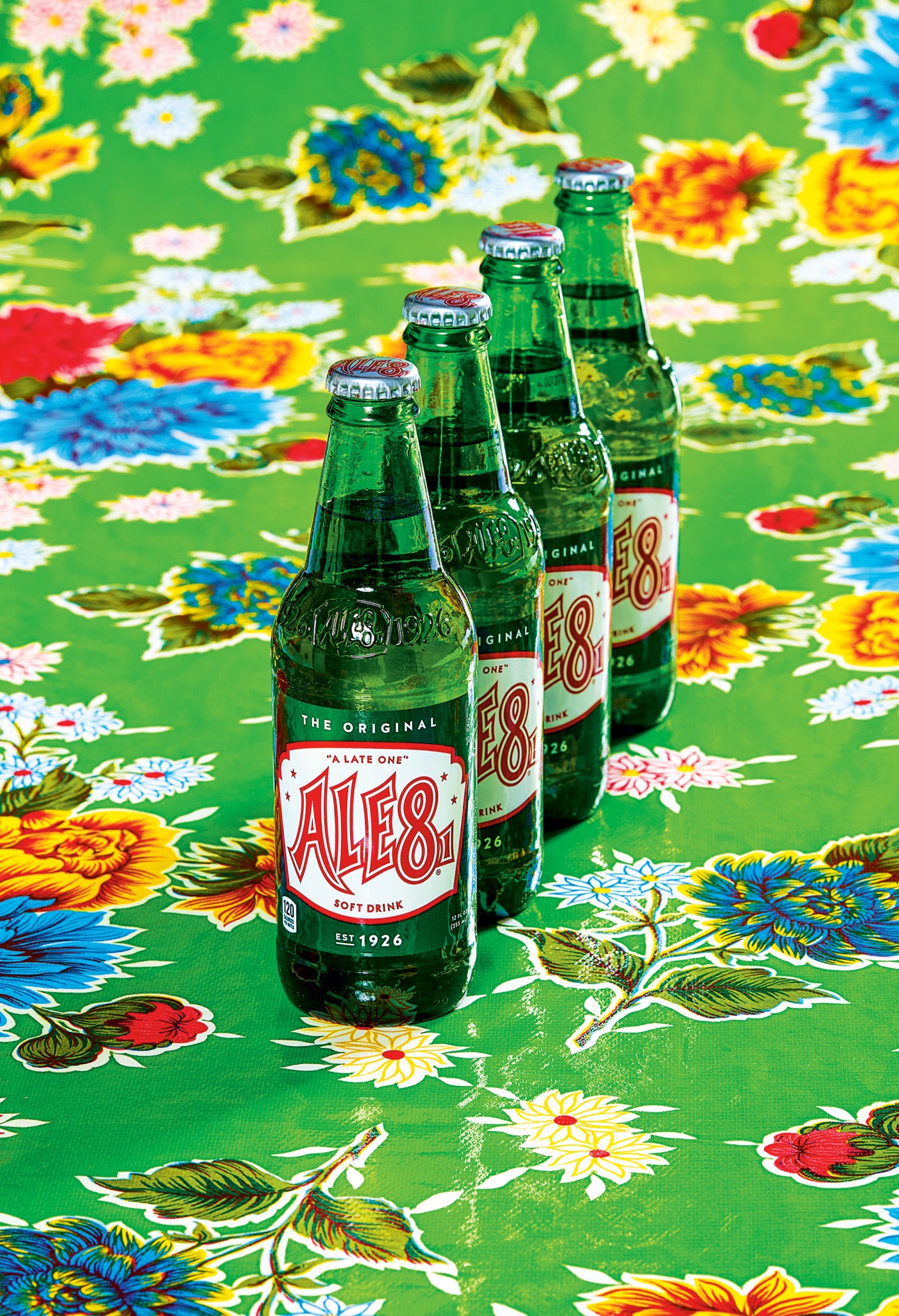 photo of a line of Ale-8 soda bottles