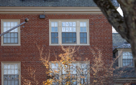 Image of a window with "Ever True" printed on it.